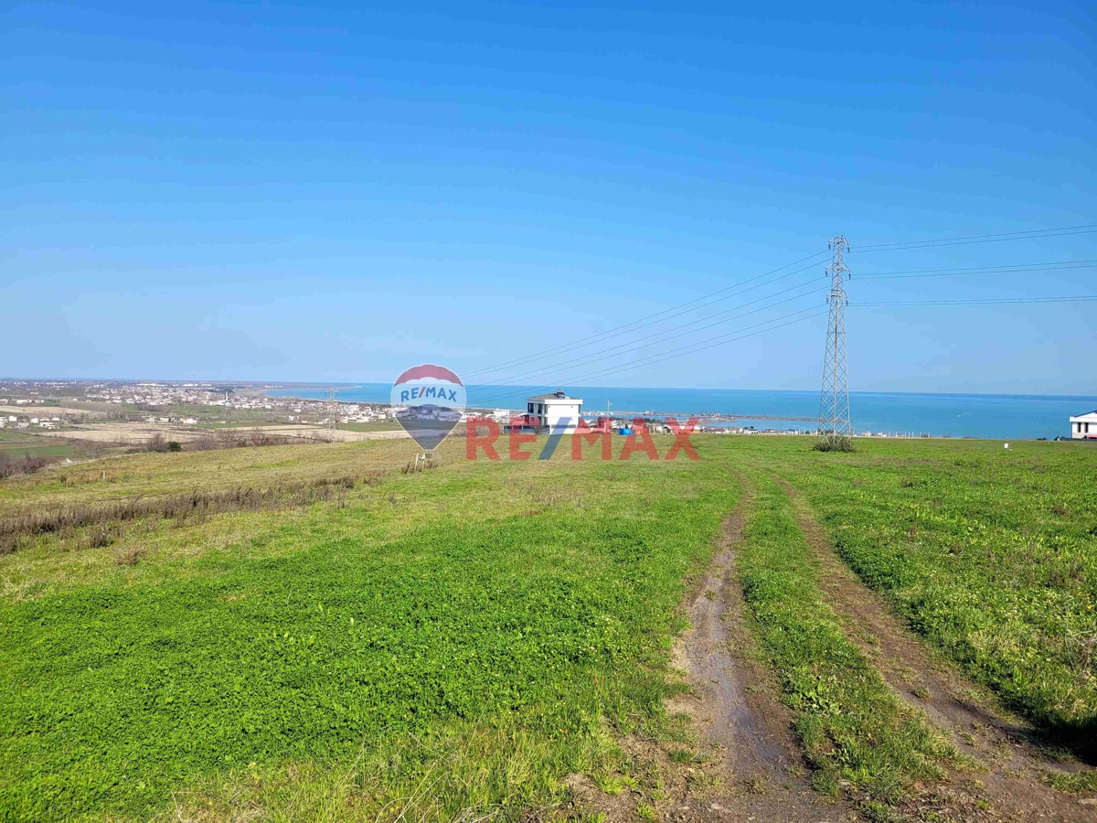 REMAXKUZEYSEVCAN GÜRLEVİKTEN TAŞKELİKTE DENİZ MANZARALI SATILIK VİLLA ARSASI