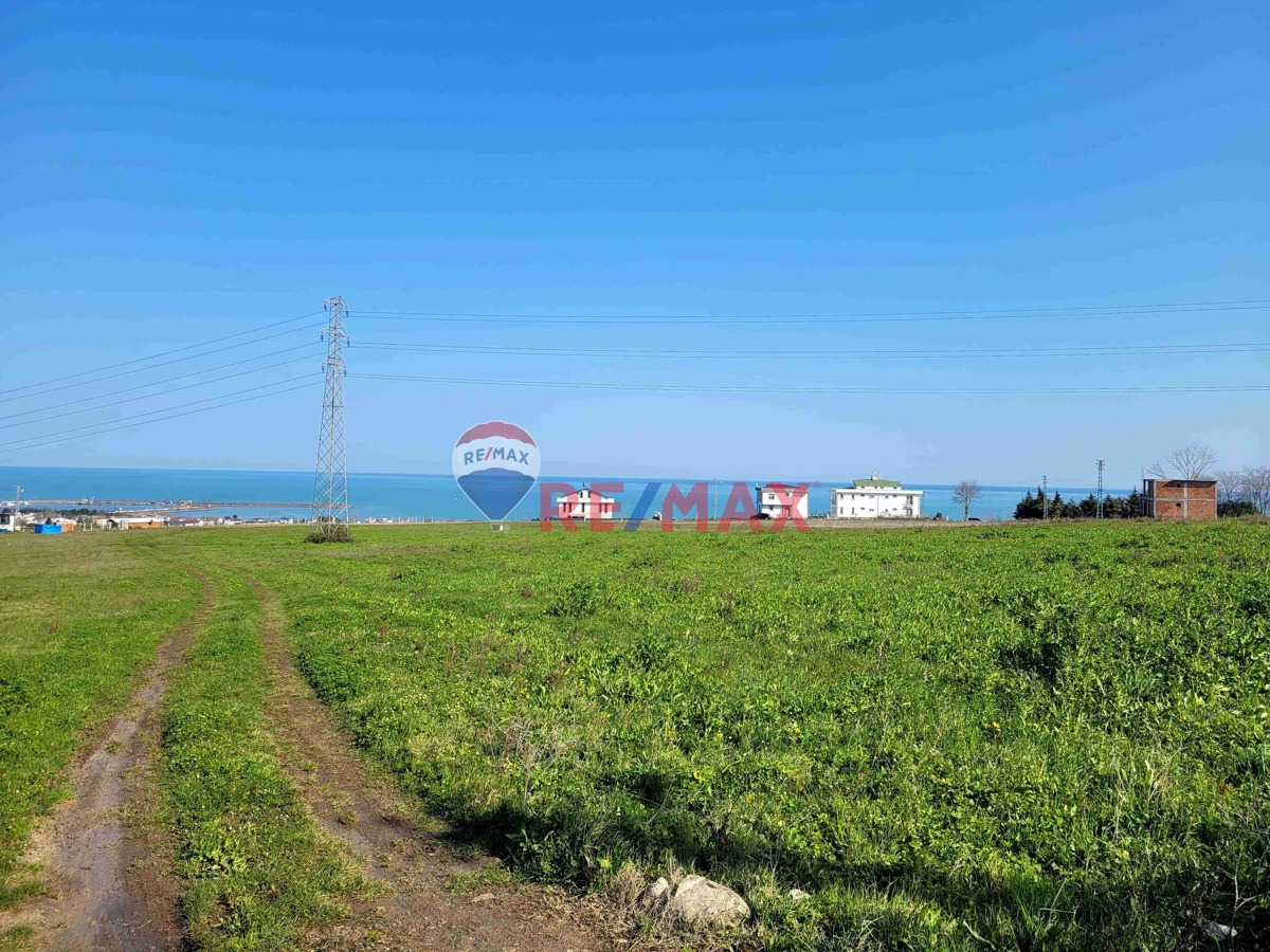 REMAXKUZEYSEVCAN GÜRLEVİKTEN TAŞKELİKTE DENİZ MANZARALI SATILIK VİLLA ARSASI