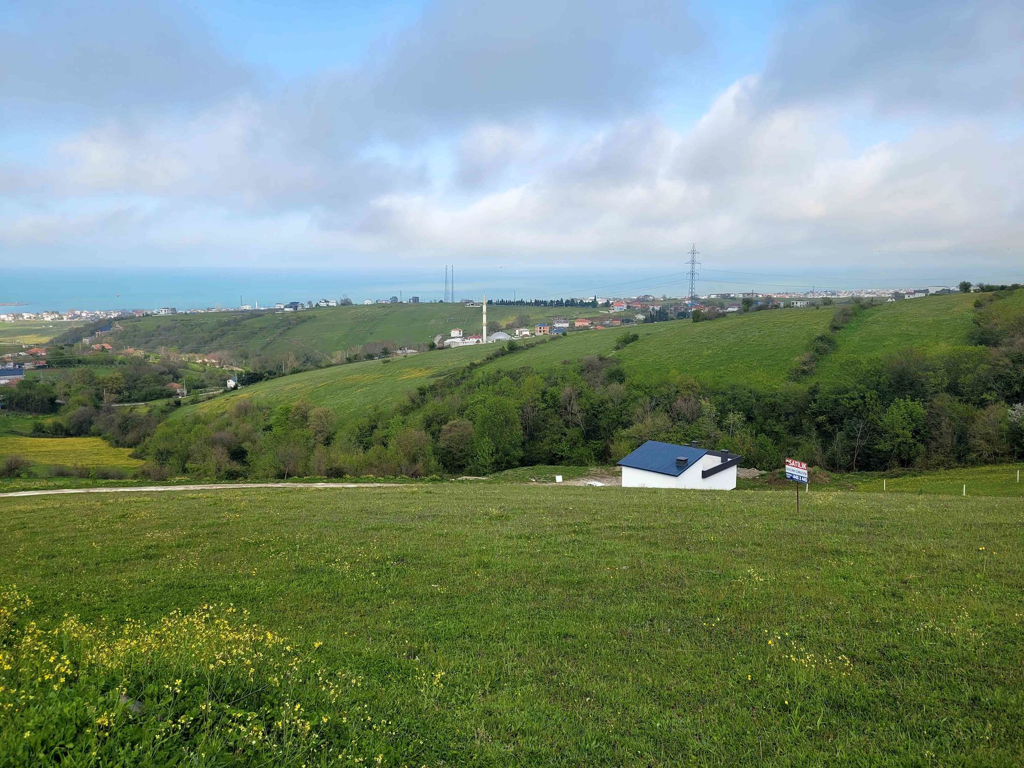 REMAX SEVCAN GÜRLEVİKTEN TAŞKELİKTE DENİZ MANZARALI SATILIK FIRSAT ARSA