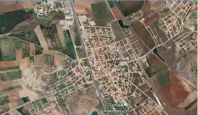 TEMELLİ GAZİ MAHALLESİN'DE 24.600 M² KONUT IMARLI SATILIK ARSA 