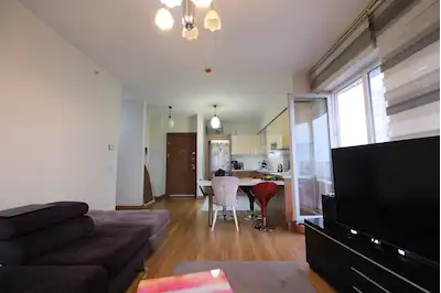 AĞAOĞLU MY WORLD EUROPE 1+1 KÖŞE BALKONLU EŞYALI SATILIK DAİRE