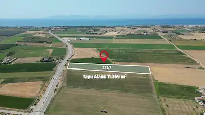 AYVALIK ALTINOVA'DA SATILIK YOLA CEPHELI TARLA