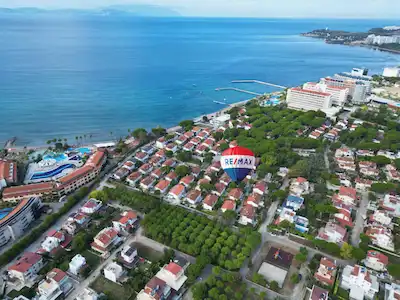 KUŞADASI'NDA ÖZEL PLAJLI MİSTUR SİTESİNDE SATILIK VİLLA !