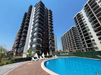 REMAX TOROS'TAN KARGIPINARI'NDA HAVUZLU SİTE İÇERİSİNDE CAZİP FİYATLI GENİŞ 1+1
