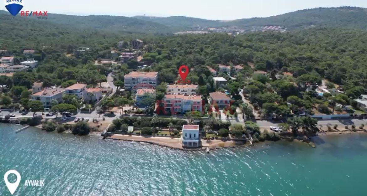 AYVALIK ORTA ÇAMLIK MEVKİNDE SAHİLE 100 METRE UZAKLIKTA 1880M2 ALANDA KONUMLANMIŞ MÜSTAKİL EV