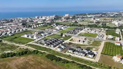 EVRENSEKİ MAHALLESİ DENİZ TARAFINDA SATILIK 855 M² VİLLA ARSASI
