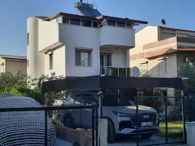 KUŞADASI GÜZELÇAMLIDA 5+1 TAM MÜSTAKİL TRİPLEKS VİLLA