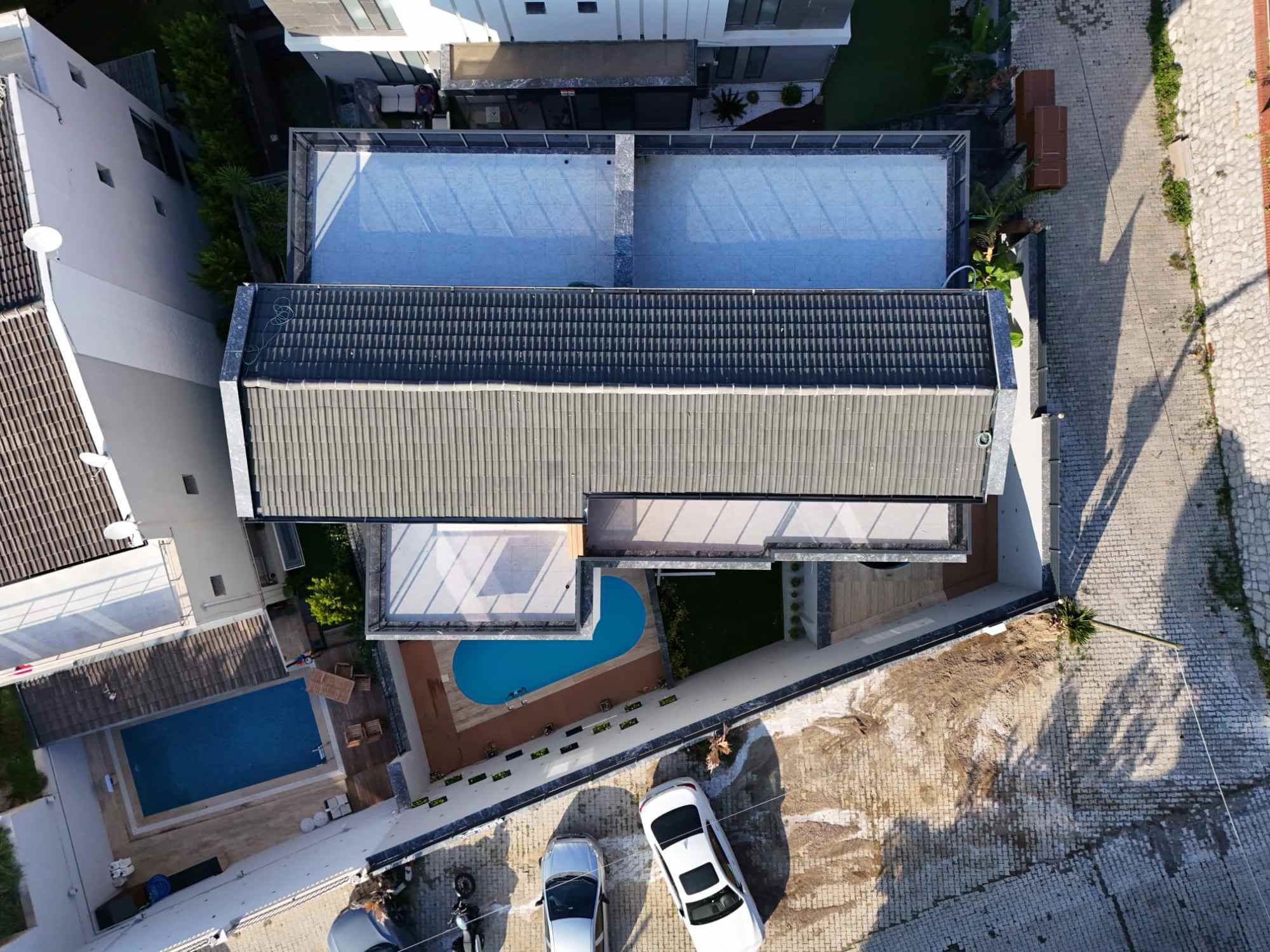 LIMANREIS'TE EŞSIZ DENIZ VE ORMAN MANZARALI MÜSTAKIL HAVUZLU LÜKS SIFIR TRIPLEX VIILLA