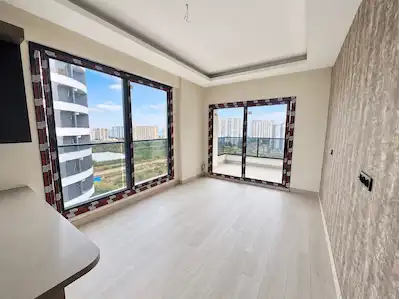 REMAX RİNA'DAN TÖMÜK'TE DENİZE 200M MESAFEDE ULTRA LÜKS 1+1