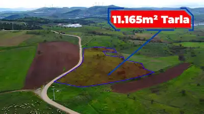 RE/MAX İNCİ'DEN YENİKÖY'DE ANAYOLA YAKIN 11.165M² SATILIK TARLA 
