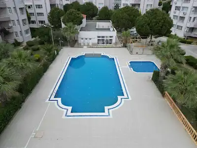 KUŞADASI EGE MAHALLESİ BATI EGE YALIKENT SİTESİ SATILIK BAHÇE DUBLEKS 3+1 DAİRE