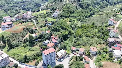 AKÇAABAT DÜRBİNAR MAHALLESİ'NDE SATILIK 2824 M2 İMARLI ARSA