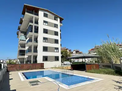 MERKEZİ KONUMDA | HAVUZLU SİTEDE SIFIR 2+1 DAİRE