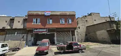 REMAX EDE'DEN ESKI SANAYI SITESINDE KOMPLE SATILIK BINA