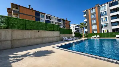 ATAKUM KÖRFEZ'DE  SIFIR 2+1 | 5. KAT | BALKONLU | 2 BANYO | DENİZ MANZARALI