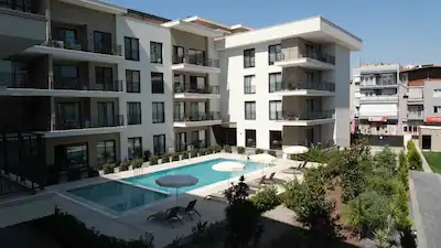 BORNOVA İKON CADDE SİTESİ'NDE SATILIK 2+1 LÜKS DAİRE