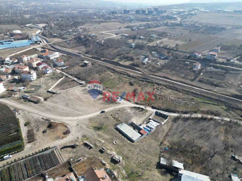 REMAX DOĞU SÜRSÜRÜ YENİ OTOGAR KARŞISI TOKİLER ALTI SATILK ARSA
