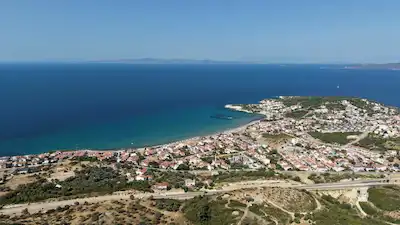 İZMİR KARABURUN’DA KREDİYE UYGUN MÜSTAKİL PARSEL TARLA