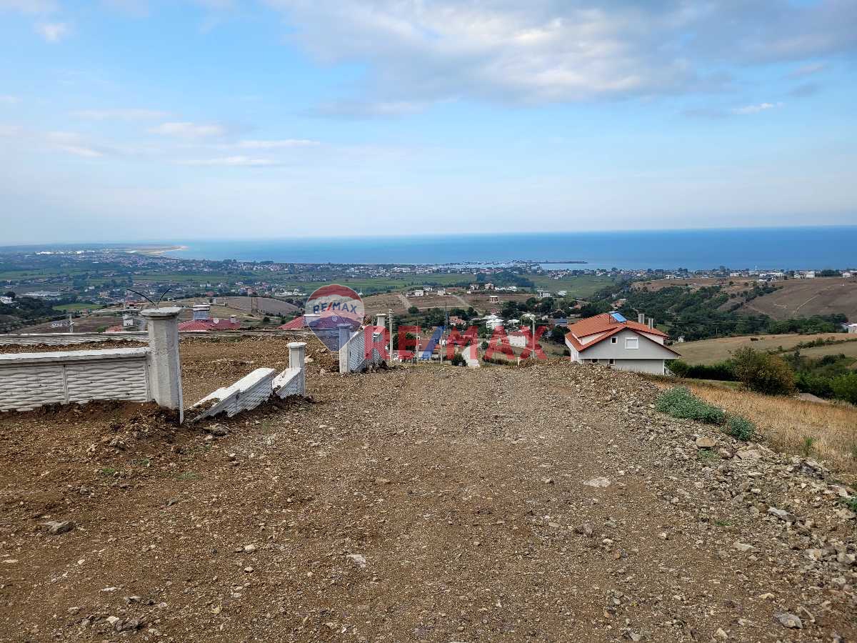 REMAX SEVCAN GÜRLEVİKTEN TAŞKELİKTE DENİZ MANZARALI SATILIK ARSA