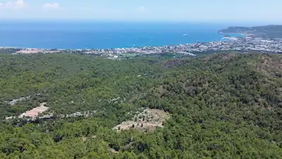 KEMER'DE YOLU AÇILMIŞ, SU HATTI MEVCUT 15.265 M² SATILIK ÇIFTLIK ARAZISI
