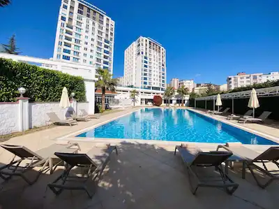 PANORAMA TOWERS'TA ŞEHİR, DENİZ VE ADALAR MANZARALI, GENİŞ TİP 1+1
