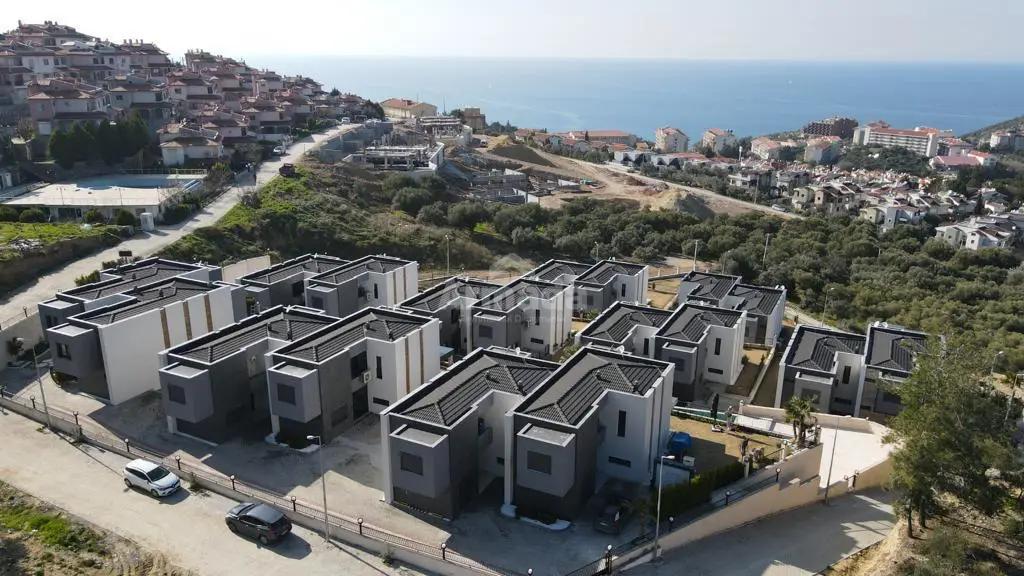 KUŞADASI ASLANTEPE SİTESİNDE DENİZ MANZARALI 4+1 KİRALIK VİLLA