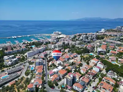 KUŞADASI TÜRKMEN MAHALLESİ'NDE MARİNAYA 400 METRE MESAFEDE SATILIK TAMAMI MÜSTAKİL BİNA 