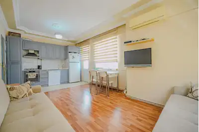 KONYAALTI ULUÇ DENİZE YÜRÜME MESAFESİNDE SATILIK DOĞALGAZLI 2+1 DAİRE