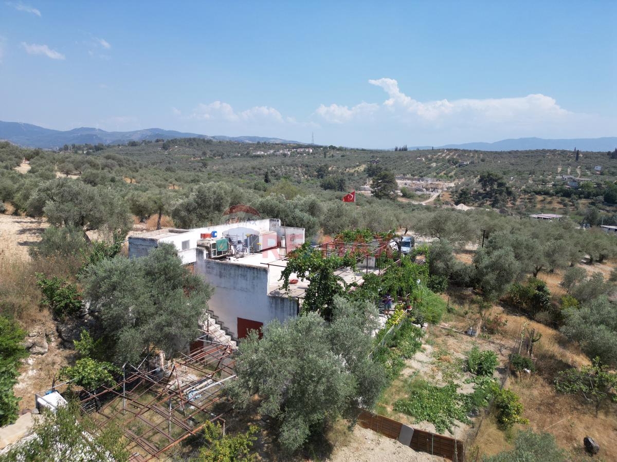 KUŞADASI MERKEZ'DE İÇİNDE EVİ OLAN ARAZİ SATILIK