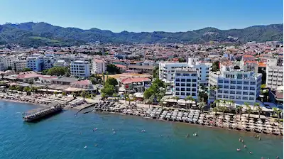 MARMARIS UZUNYALI'DA DENİZE SIFIR SATILIK İŞYERI VE EV (325M2)