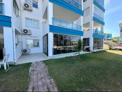 KUŞADASI DEĞİRMENDERE’DE 2+1 | BAHÇE KATI | 2 BANYO | BALKONLU SATILIK DAİRE