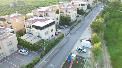 REMAX RİNA'DAN DENİZ VE ŞEHİR MANZARALI ÖZEL HAVUZLU VİLLA