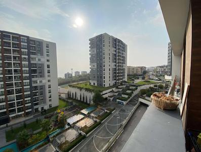 İZMIT TUANA EVLERI'NDE ARA KAT 2+1 SATILIK DAIRE