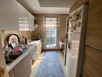 İZMIT TUANA EVLERI'NDE ARA KAT 2+1 SATILIK DAIRE