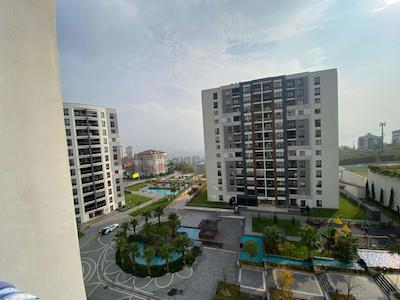 İZMIT TUANA EVLERI'NDE ARA KAT 2+1 SATILIK DAIRE