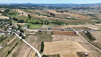 KÖRFEZ OSMANLI YOLA CEPHE SATILIK 12.655 M² TARLA