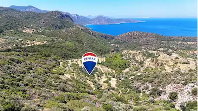 DATÇA CUMALI MAHALLESINDE SATILIK DENIZ GÖREN YATIRIMLIK TARLA