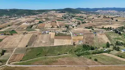 KÖRFEZ OSMANLI YOLA CEPHE SATILIK 17.682 M² TARLA