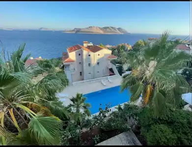 ANTALYA KAŞ YARIMADA SATILIK MEIS ADASI MANZARALI BAHÇE DUBLEKS