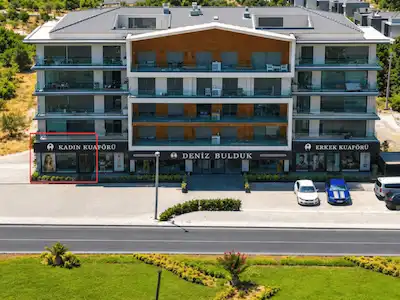 GÜZELBAHÇE YELKİ 32'DE ANA CADDE ÜZERİ KİRACILI TİCARI MÜLK