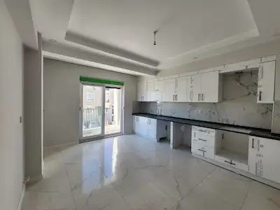 KORKUTELİ / KARŞIYAKA MAH.DE / SIFIR GENİŞ 2+1