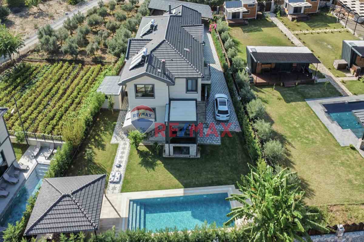 GÖCEK’TE DOĞANIN KALBİNDE SATILIK LÜKS VİLLA – HUZURUN VE KONFORUN BULUŞMA NOKTASI