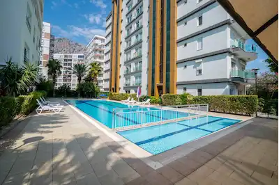 KONYAALTI DEVLET HASTANESINE 450 METRE HAVUZLU SİTEDE 1+1 SATILIK DAİRE