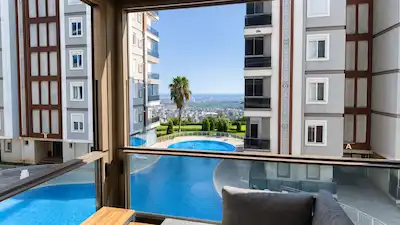LOCA ANTALYA EVLERIN'DE DENIZ VE ŞEHIR MANZARALI SATILIK 2+1 | KREDİYE UYGUN