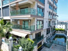 KUŞADASI MY WORLD 2'DE KEYIFLI BAHÇE KATI 2+1 SATILIK DAİRE