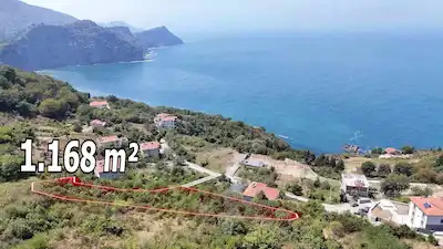 REMAX MAVI'DEN BURUNCUK TA 1168 M² KONUT IMARLI DENIZ MANZARALI