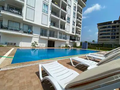 AVM'YE VE HAVALİMANINA YAKIN HAVUZLU SİTEDE FERAH 1+1 KIRALIK