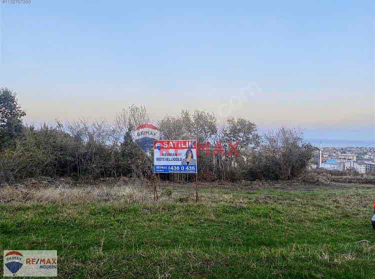 ASUMAN MÜTEVELLİOĞLU’NDAN TAFLAN’DA SATILIK FUL DENİZ MANZARALI ARSA