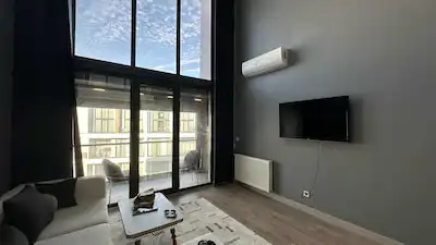 İN MARİ SİTEİSİNDE KİRALIK LÜKS DENİZ MANZARALI GİYOTİN CAM BALKONLU 1+1