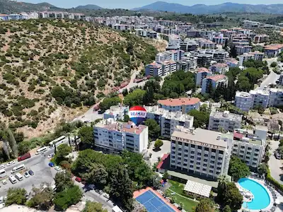 KUŞADASI GARAJ ARKASINDA KÖŞE KONUMLU | 80 M² ASMA KATLI TİCARİ DÜKKAN |